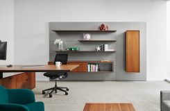 A HALO cantilever desk and executive workwall elevate the sophisticated palette of this private office. thumbnail